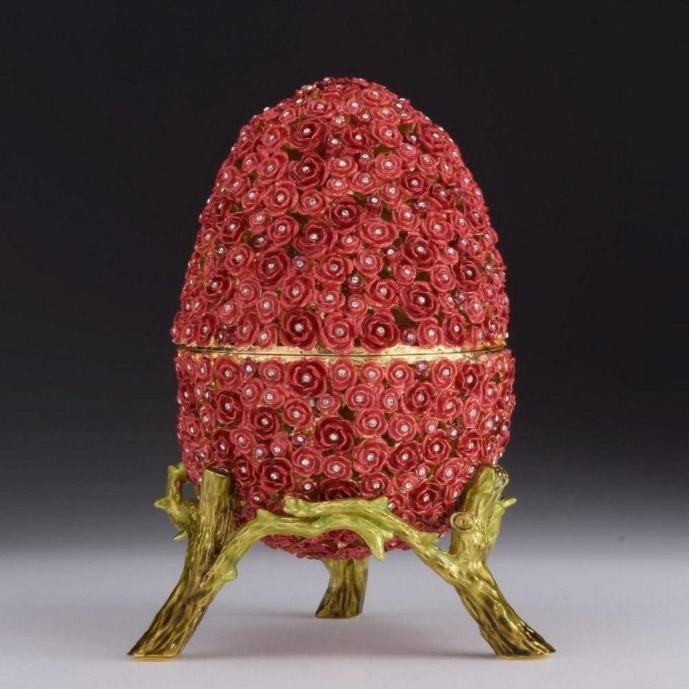 Red Flowers Faberge Egg: Red Flowers Faberge Egg Enamel Painted Trinket Box Decorated with Austrian Crystals. Plated with 24K Gold. Each crystal is handpicked and artistically placed on each piece. The trinket box has a magn