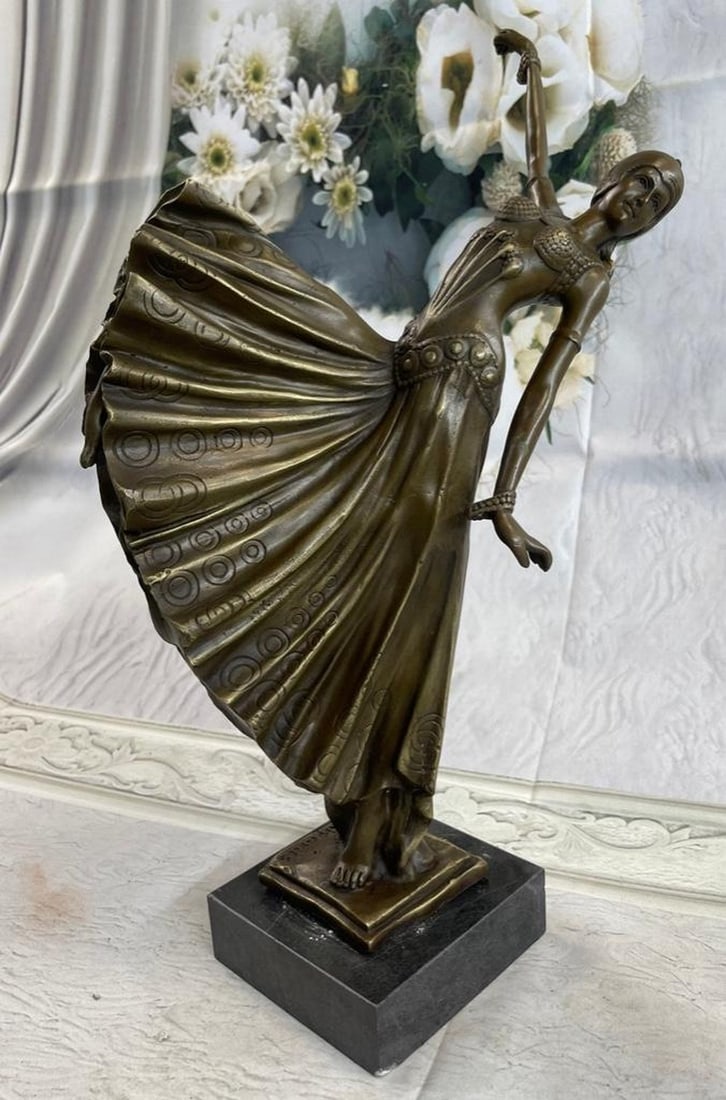 Chorus Dancer Bronze Sculpture: Chorus Dancer Bronze Sculpture The beautiful woman is viewed from her left side in mid-dance. She seems to have leaped forward and landed on tiptoes, one arm up the other down, her long dress fanning