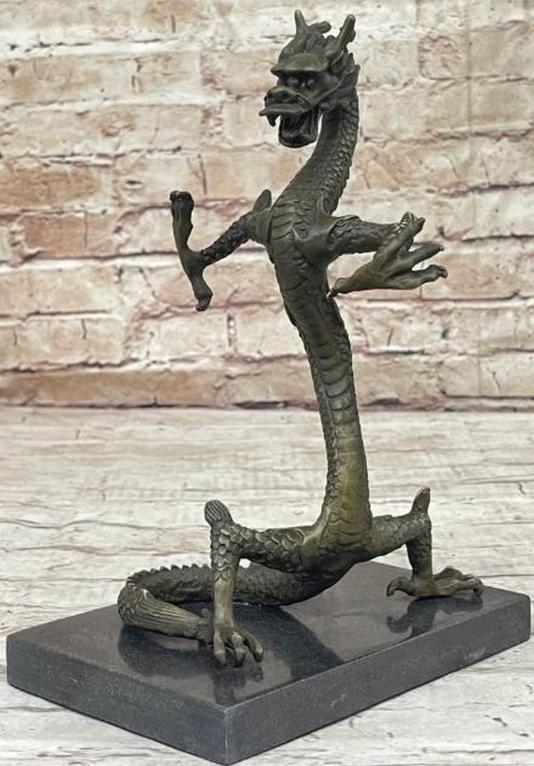 Rise of the Dragon Bronze Sculpture: Rise of the Dragon Bronze Sculpture This striking bronze sculpture, bearing the signature of artist Fisher, depicts a slender Chinese dragon rising powerfully on its hind legs, embodying grace, energ
