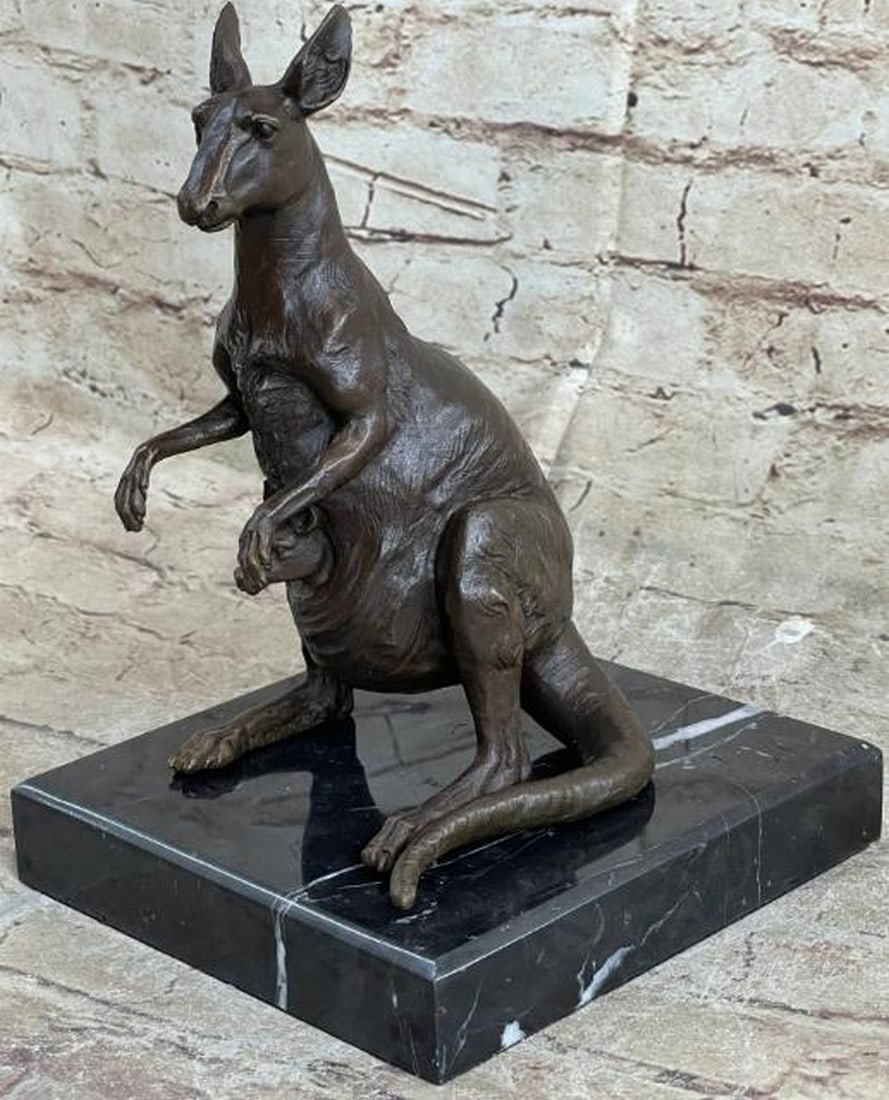 Outback Watch: Hot Cast Bronze Kangaroo with Joey: Outback Watch: Hot Cast Bronze Kangaroo with Joey This finely crafted hot cast bronze reproduction, bearing the signature of artist J. Mogniez, captures the iconic presence of Australia’s beloved m