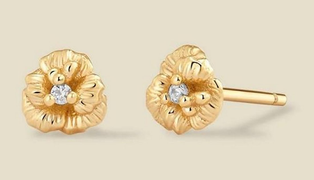 Gold Vermeil October Marigold CZ Stud Earrings: 18k Gold Vermeil Lab-Grown Sapphire Hoop Earrings A classic hoop silhouette accented with radiant lab-grown white sapphires for a refined, polished finish. Lightweight and comfortable for everyday wea