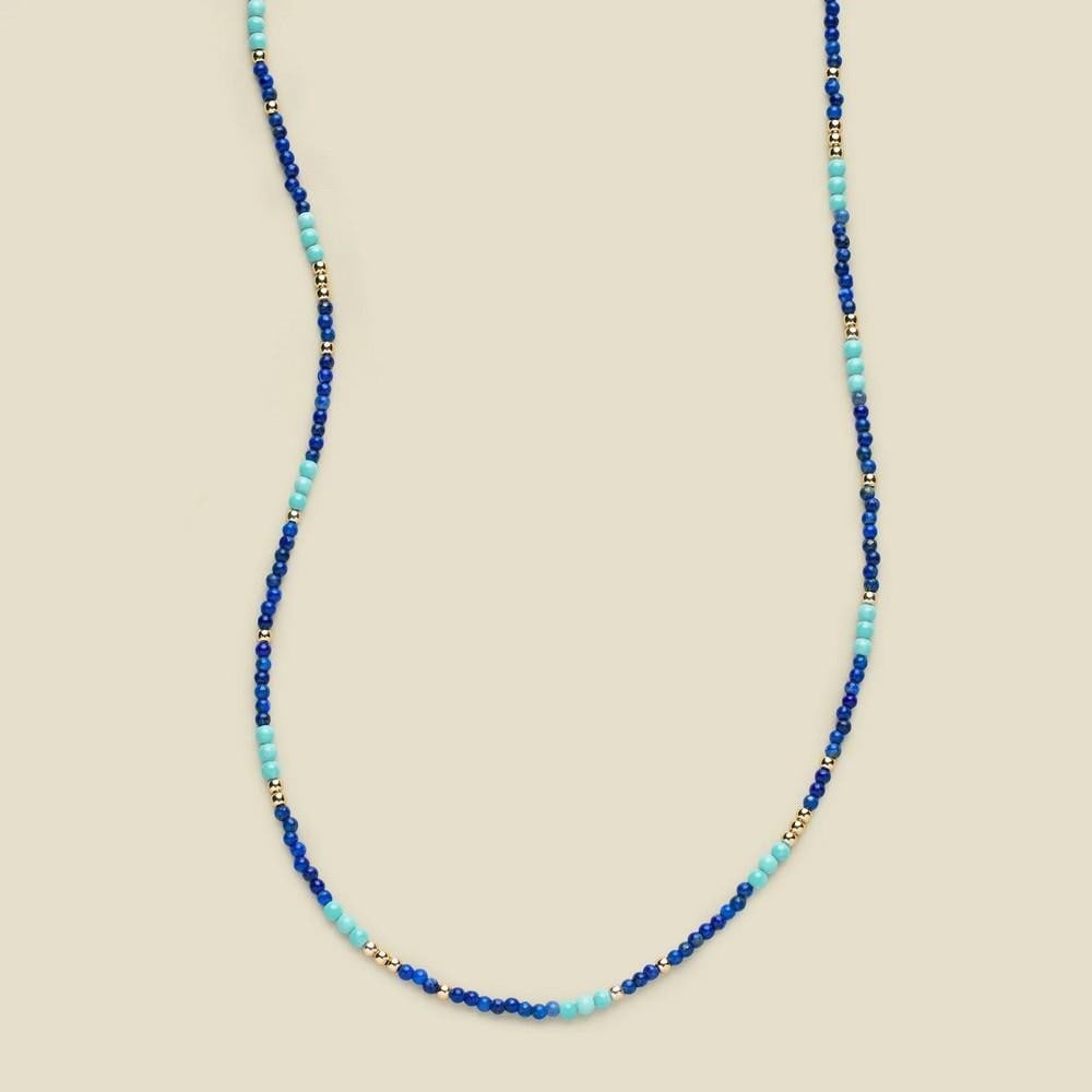 Azure Harmony Turquoise & Lapis Beaded Necklace – Gold Vermeil: Azure Harmony Turquoise & Lapis Beaded Necklace – Gold Vermeil A choker-style necklace featuring 2mm beads of turquoise and lapis, known for their natural variation and unique color patterns. Th