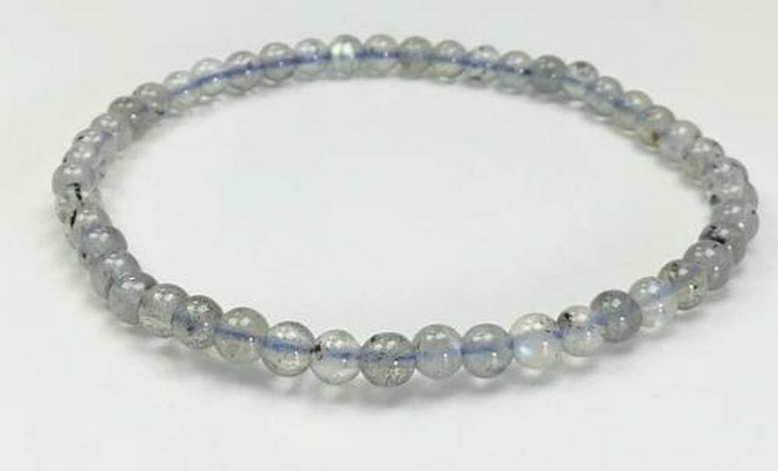 Mystic Aura Labradorite Bracelet: Mystic Aura Labradorite Bracelet. This enchanting beaded bracelet showcases the mesmerizing beauty of Labradorite. Revered as the "Stone of Magic," Labradorite is believed to enhance intuitio