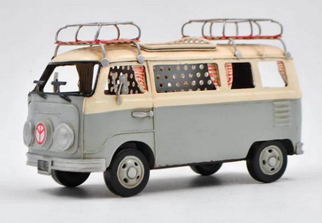 VW Circa 1966 Tin Model 1:18 Scale Camper Van with Pen Holder Surfboard Figurine: VW Circa 1966 Tin Model 1:18 Scale Camper Van with Pen Holder Surfboard Figurine Add a vintage touch to your table, desk, or shelf with this Volkswagen Mini Bus model. Crafted with a rustic iron frame