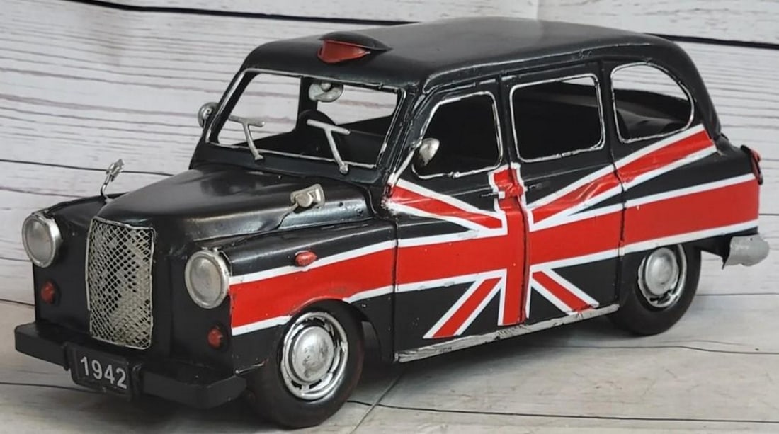 Iconic Ride: 1966 Black London Taxi with British Flag (1 of 4)