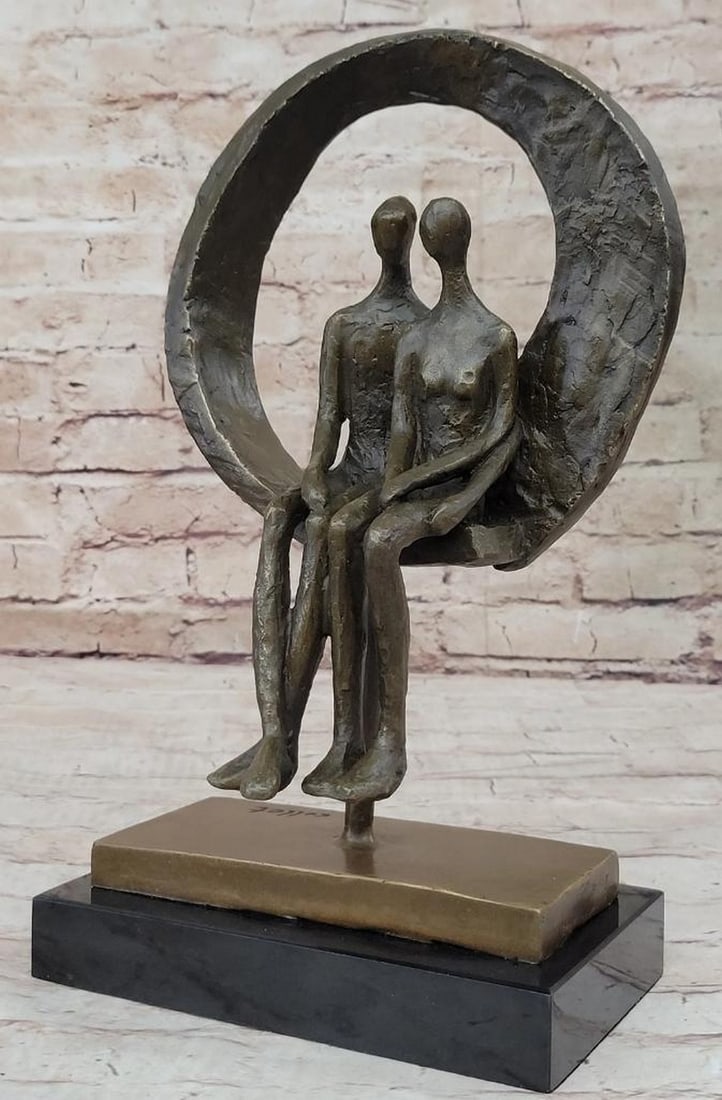 Collet Sitting Abstract Couple Bronze Sculpture - 13" x 7": Collet Sitting Abstract Couple Bronze Sculpture - 13" x 7" Introducing the Collet Sitting Abstract Couple Bronze Sculpture, a captivating masterpiece that infuses modern artistic allure into a