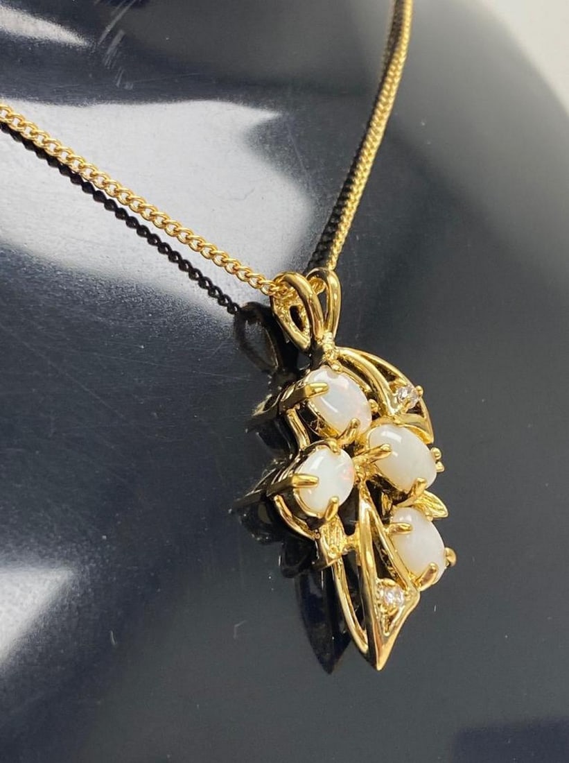 Designer Opal Mainstone & Swarovski Crystals Pendant Paired With 18KTGP Necklace: A Designer Opal Mainstone & 2 Swarovski Secondary Crystals Pendant Paired With 18KTGP Cuban Link Necklace. Handcrafted in Israel, top quality vintage craftsmanship. Please View Photos For Furthe