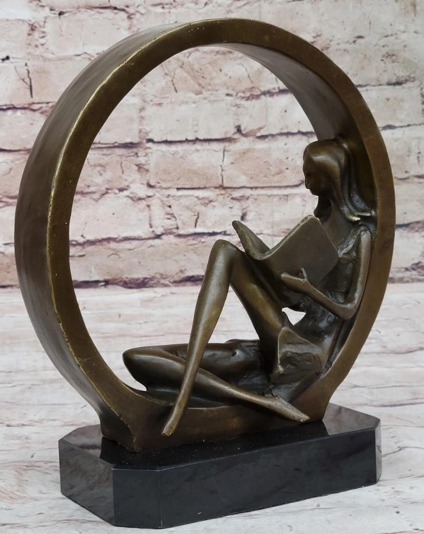 Young Girl Reading Bronze Sculpture by Collett – 9" x 7.5": Young Girl Reading Bronze Sculpture by Collett – 9" x 7.5" This bronze sculpture depicts a young girl seated and reading a book, rendered with soft contours and an abstract approach to form.