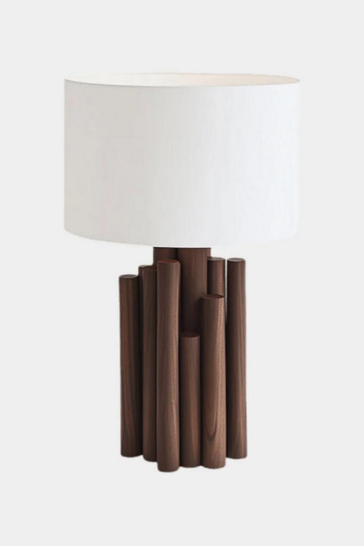 Vertical Rhythm Wooden Table Lamp: Vertical Rhythm Wooden Table Lamp Minimalist yet expressive, this handcrafted table lamp features a sculptural base composed of vertically stacked wooden rods in varying heights and warm natural