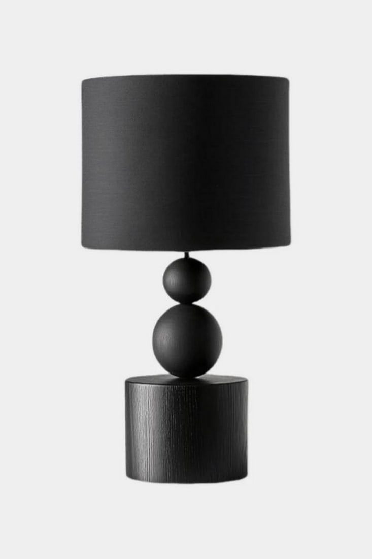 Contemporary Black Stacked Sphere Lamp: Contemporary Black Stacked Sphere Lamp Bold and sculptural, this modern table lamp features a cylindrical base topped with two stacked spheres, creating a silhouette that’s both architectural and