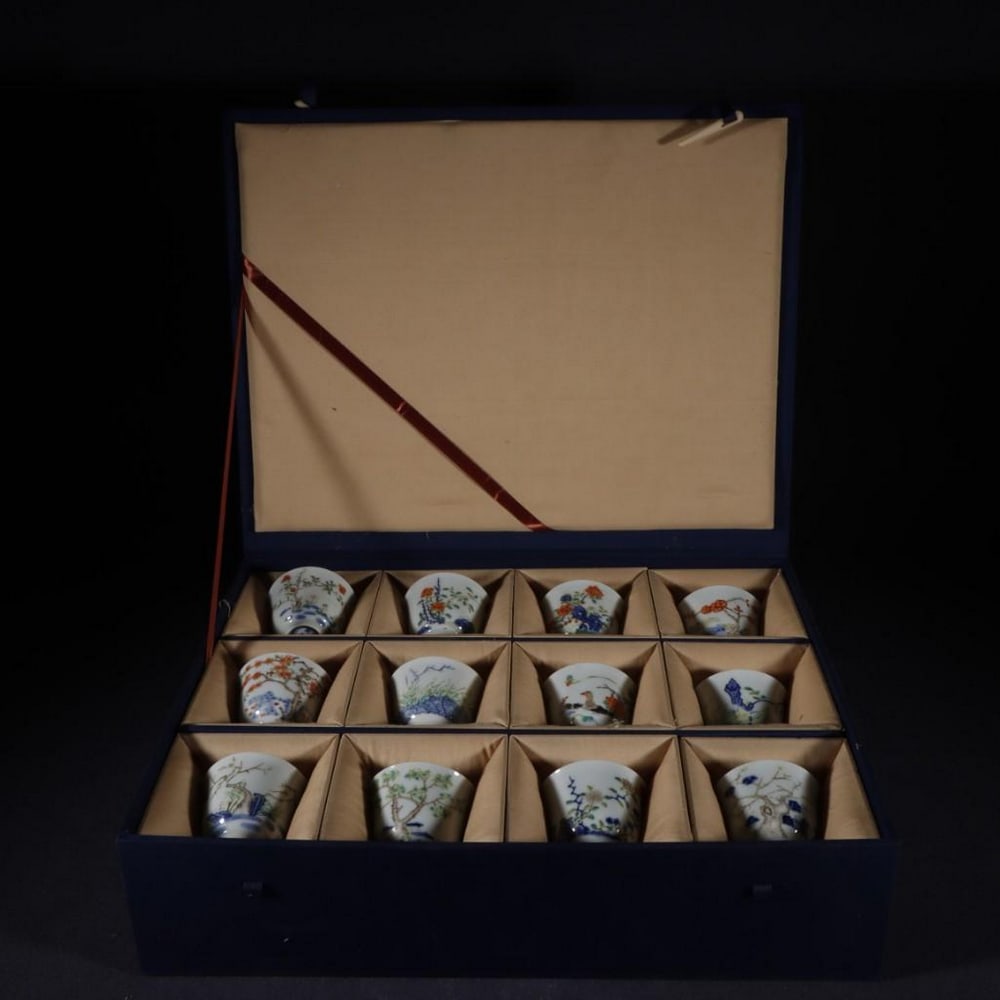 Old Collection Qing Dynasty Kangxi Doucai Twelve Flower God Cups Set: Old Collection Qing Dynasty Kangxi Doucai Twelve Flower God Cups Set A rare and exquisite set of twelve porcelain cups from the Kangxi period of the Qing Dynasty, decorated using the refined doucai te