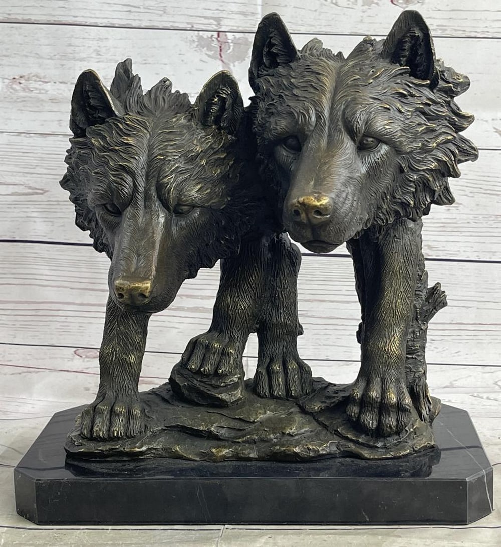 Dual Wolf Head Busts Bronze Sculpture On Marble Base - 12" x 12": Dual Wolf Head Busts Bronze Sculpture On Marble Base - 12" x 12" This extraordinary bronze sculpture by Williams showcases the power and beauty of two wolf heads in stunning detail. Each wolf