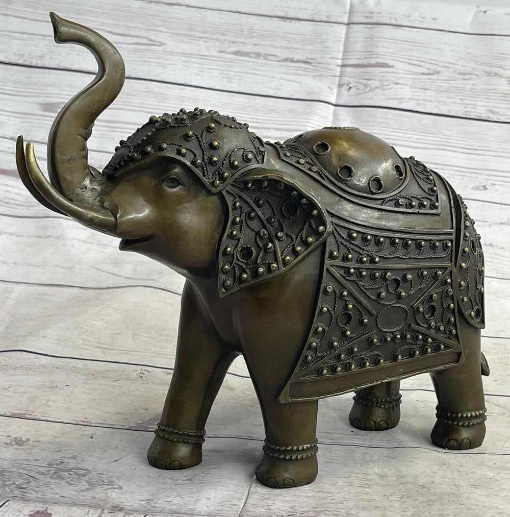 Signed Laughing Elephant Bronze Sculpture – 10" x 13": Signed Laughing Elephant Bronze Sculpture – 10" x 13" This charming bronze sculpture captures a laughing elephant in a playful and graceful pose, embodying warmth and good fortune with maste