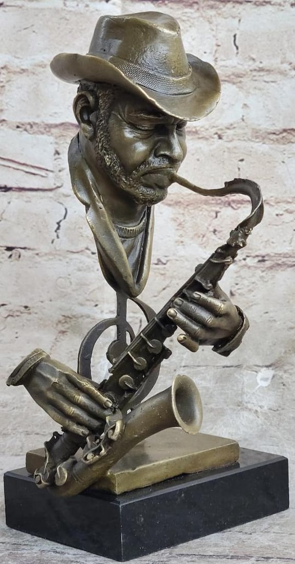 Original Saxophone Player Bust Bronze Sculpture On Marble Base - 10" x 5": Saxophone Player Bust Bronze Sculpture- 10" x 5" Presenting an exquisite masterpiece, behold this stunning bronze sculpture depicting a black musician passionately playing the saxophone. This