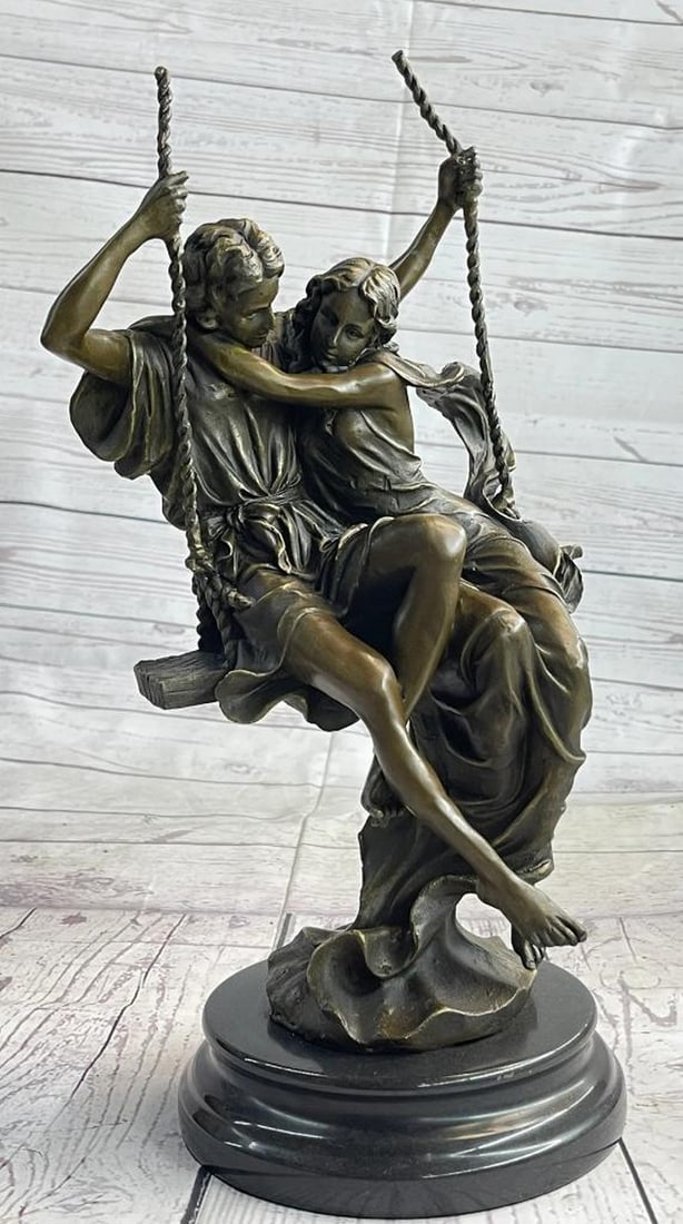 Couple on a Swing Bronze Sculpture by Cesaro - 14" x 7.5": Couple on a Swing Bronze Sculpture by Cesaro - 14" x 7.5" Elevate your space with the Couple on a Swing Bronze Sculpture, an exquisite piece from European Bronze Finery. Handcrafted with metic