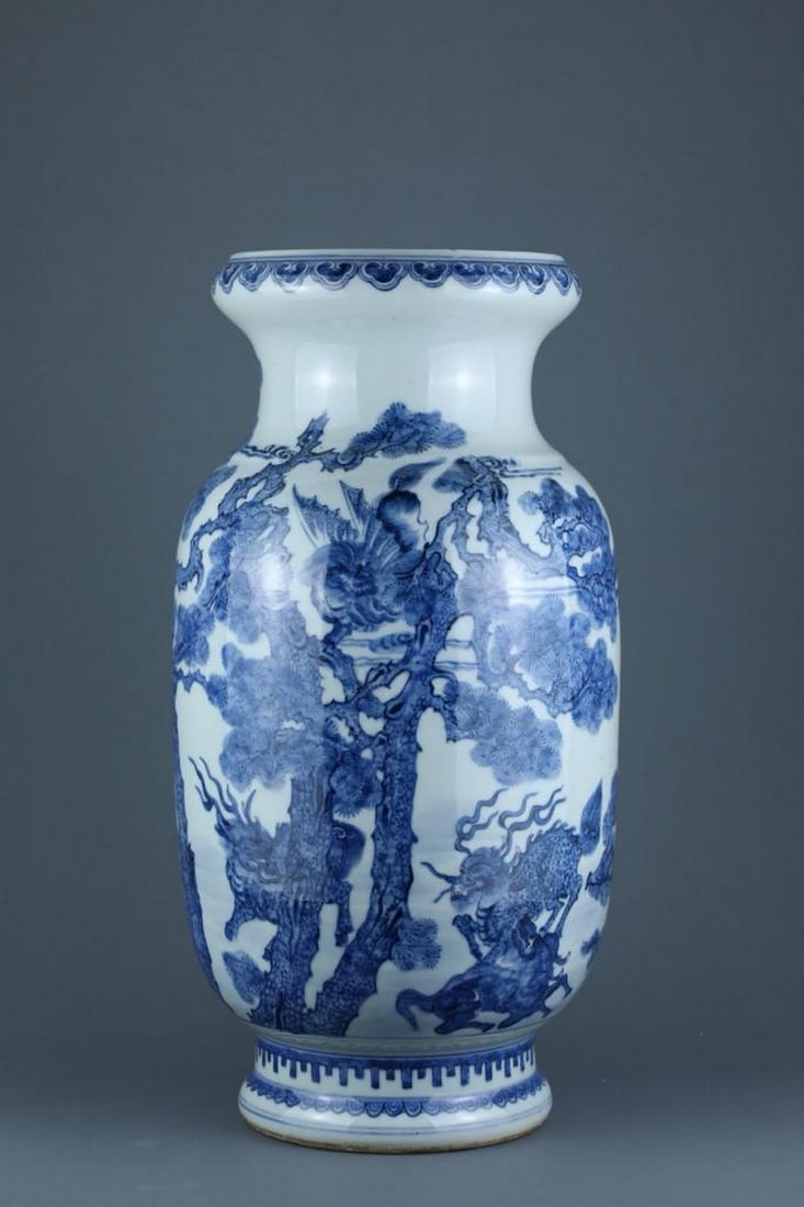 Qing Dynasty Kangxi Blue and White Pine Tree and Auspicious Beast Lantern Bottle: Qing Dynasty Kangxi Blue and White Pine Tree and Auspicious Beast Lantern Bottle A finely crafted lantern-shaped porcelain bottle from the Kangxi period of the Qing Dynasty, decorated in classic blue