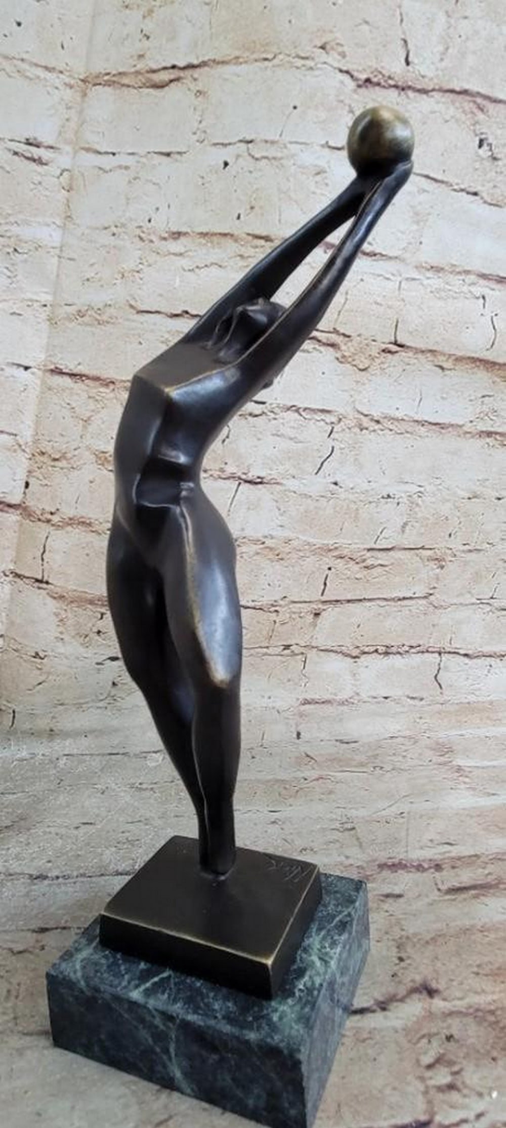 Abstract Basketball Player Bronze Sculpture - 12.5" x 3.5": Abstract Basketball Player Bronze Sculpture - 12.5" x 3.5" Abstract Basketball player bronze figurines look lovely and leaves so much to the imagination as to the subjects` thinking and st