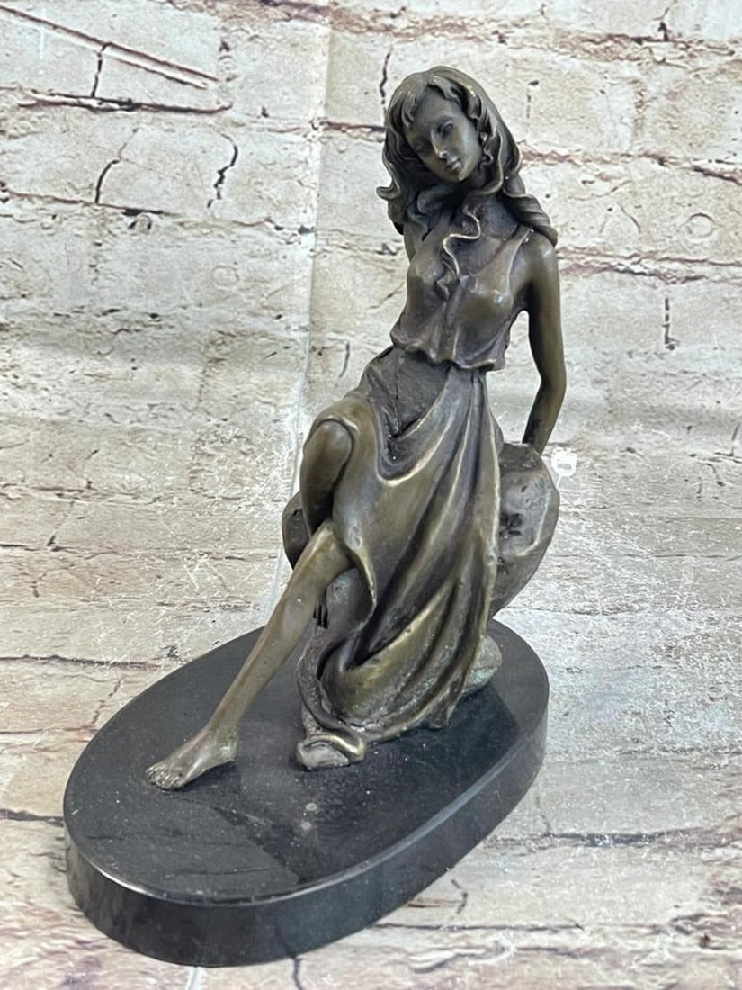Women Laying Against Rock Original Bronze Statue - 8" x 6": Women Laying Against Rock Original Bronze Statue - 8" x 6" This captivating sculpture captures heightened sensuality, embodying grace and strength. The alluring form drapes over the rock, merg