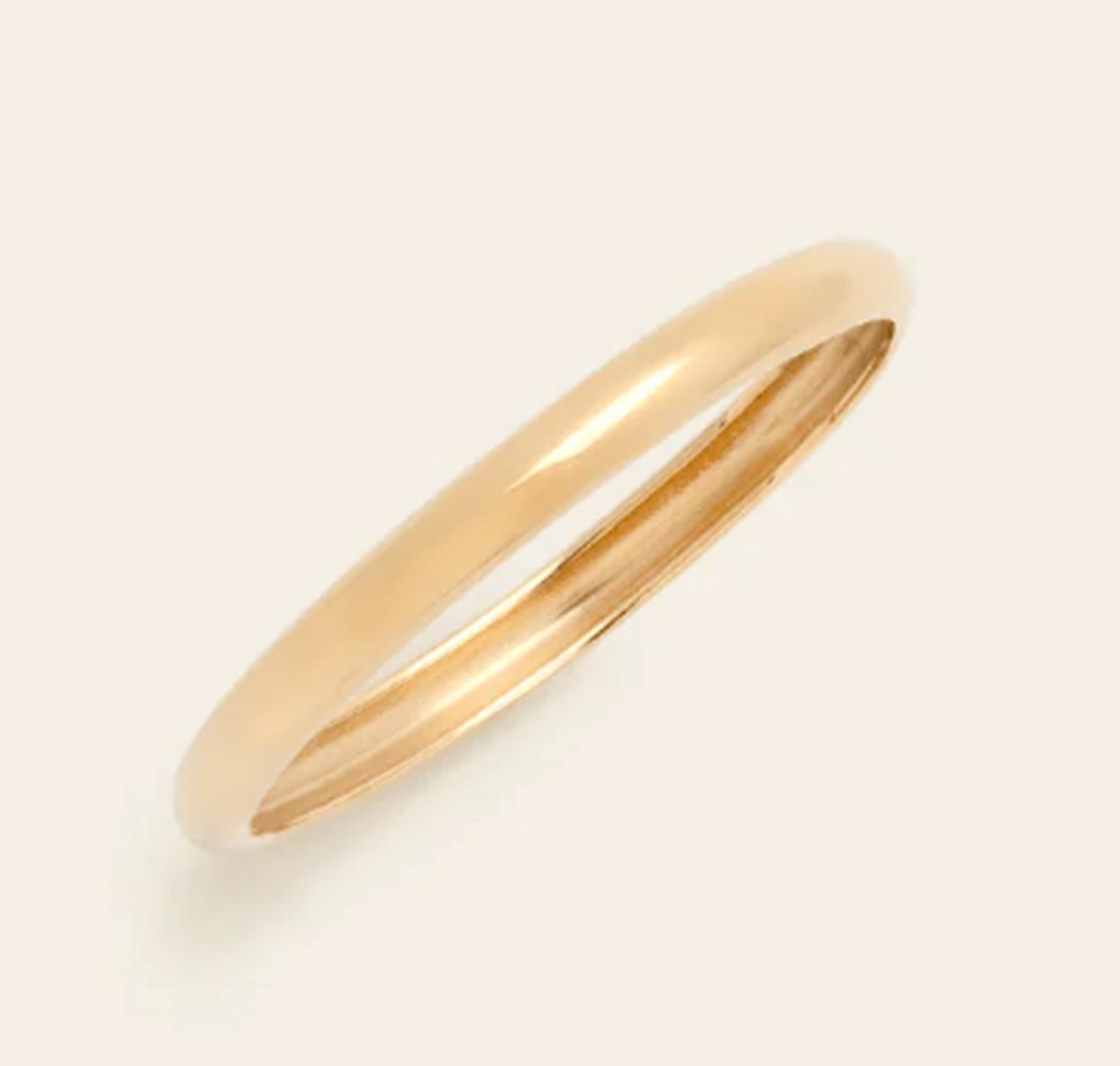 14K Solid Gold Women's Band: 14K Solid Gold Women's Band This 14K solid gold women's band exudes timeless elegance and simplicity. Crafted from pure gold, its sleek design and smooth finish make it a versatile choice for 