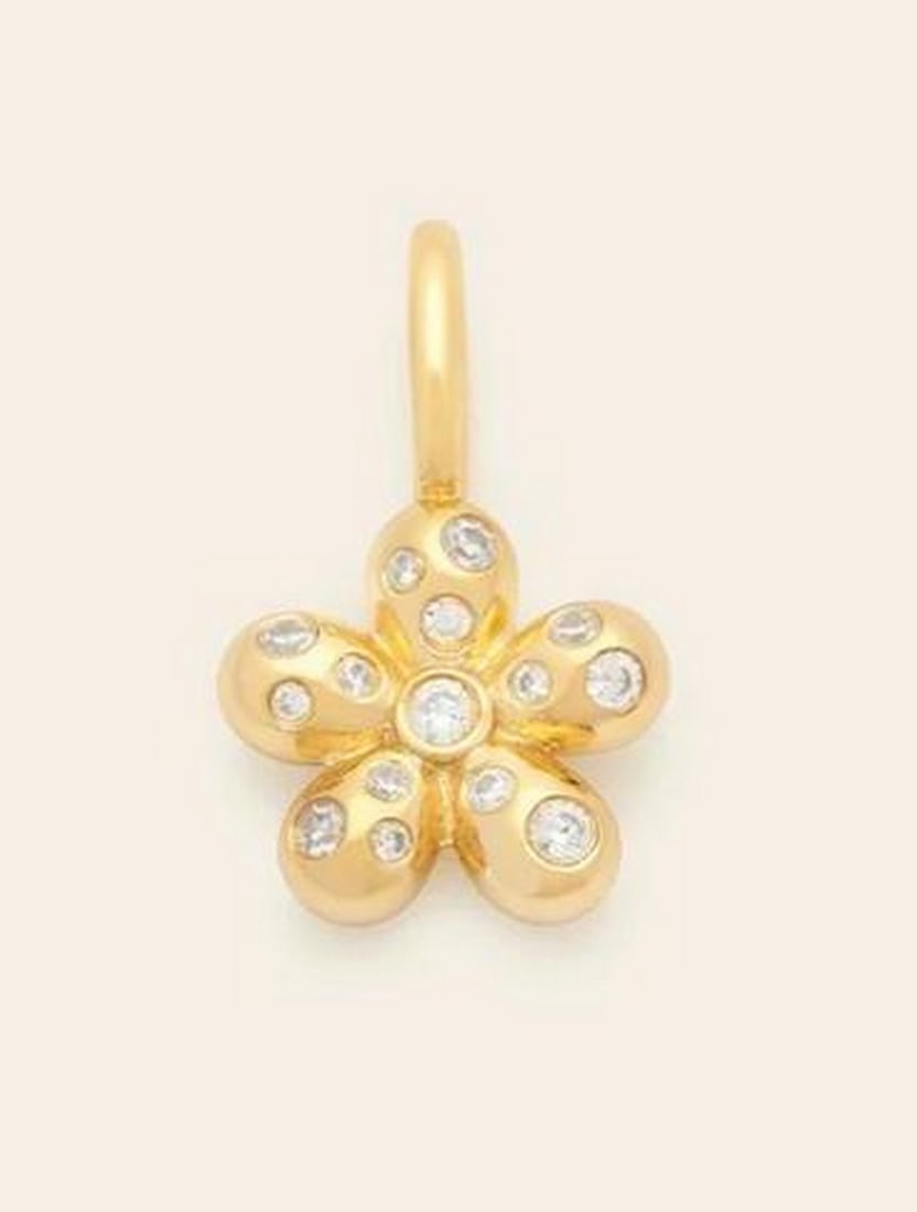 Blossom Charm Pendant: Blossom Charm Pendant Embrace your playful side and bring a touch of flower power to your stack. With its puffed design and sparkling charm, this piece adds a fun, youthful vibe to any look! Crafted