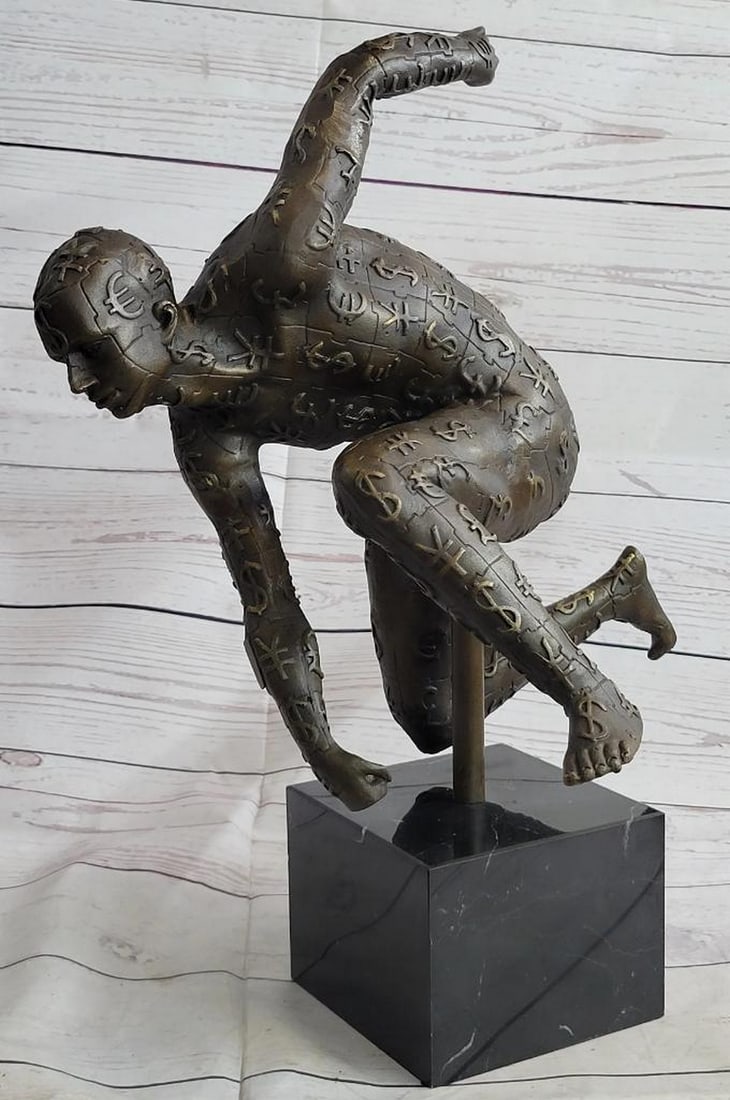 Man Ready For Race Bronze Sculpture On Marble Base - 17" x 17": Man Ready For Race Bronze Sculpture On Marble Base - 17" x 17" This abstract is a very odd and creative one, we guarantee you that you will have people talking about it. You can tell its a fig