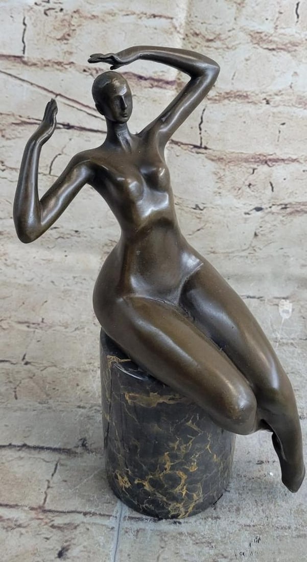 Nude Reclining Woman Original Bronze Sculpture Signed by Juno - 10" x 5": Nude Reclining Woman Original Bronze Sculpture Signed by Juno - 10" x 5" Admire the elegance of this bronze sculpture featuring a reclining woman poised atop a marble base. The artist's me