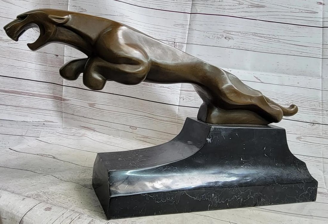 Milo Original Majestic Jumping Jaguar Bronze Sculpture On Marble Base - 13" x 26": Milo Original Majestic Jumping Jaguar Bronze Sculpture On Marble Base - 13" x 26" This extraordinary bronze sculpture, meticulously crafted by the renowned artist Milo, showcases the power and