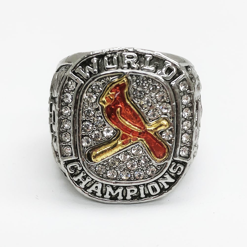 2011 St. Louis Cardinals - MLB Championship Inspired Ring: 2011 St. Louis Cardinals - MLB Championship Inspired Ring. A Red Enameled Perching Cardinal Faces The Stone Crusted Silver Colored Ring. One Of The Nicest Designs For A Champions Ring. View Photos For