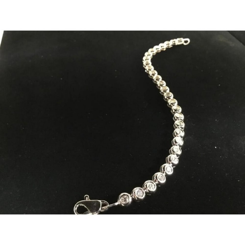 Custom Made 18K Solid White Gold Ladies Bracelet with 2.2ct Diamonds: An Exquisite 18K Solid White Gold Woman's Bracelet With 2.2ct of Inset Diamonds (VS,F2G,Good). A flag ship of Italian Craftsmanship for ladies fashion and apparel. This Bracelet is favorite in custom