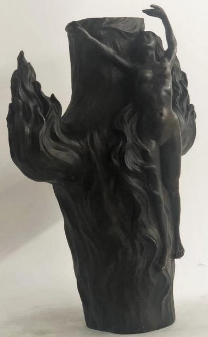Nature's Embrace Bronze Sculpture: Nature's Embrace Bronze Sculpture Mysterious and enchanting, this large hot cast bronze reproduction sculpture presents a stunning nude nymph seamlessly intertwined with nature. Her elongated form