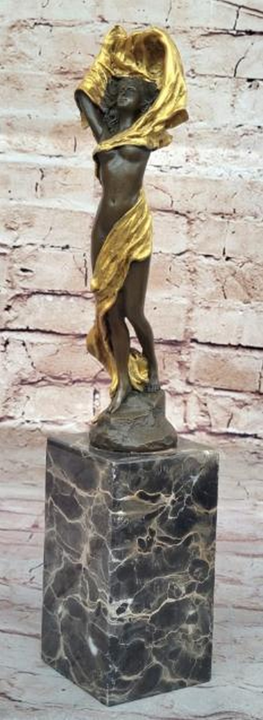 Semi-Nude Woman with Draped Clothing Bronze Sculpture: Semi-Nude Woman with Draped Clothing Bronze Sculpture Sensual and striking, this bronze sculpture captures a captivating moment as a woman lifts loose, flowing clothing over her head, revealing her se