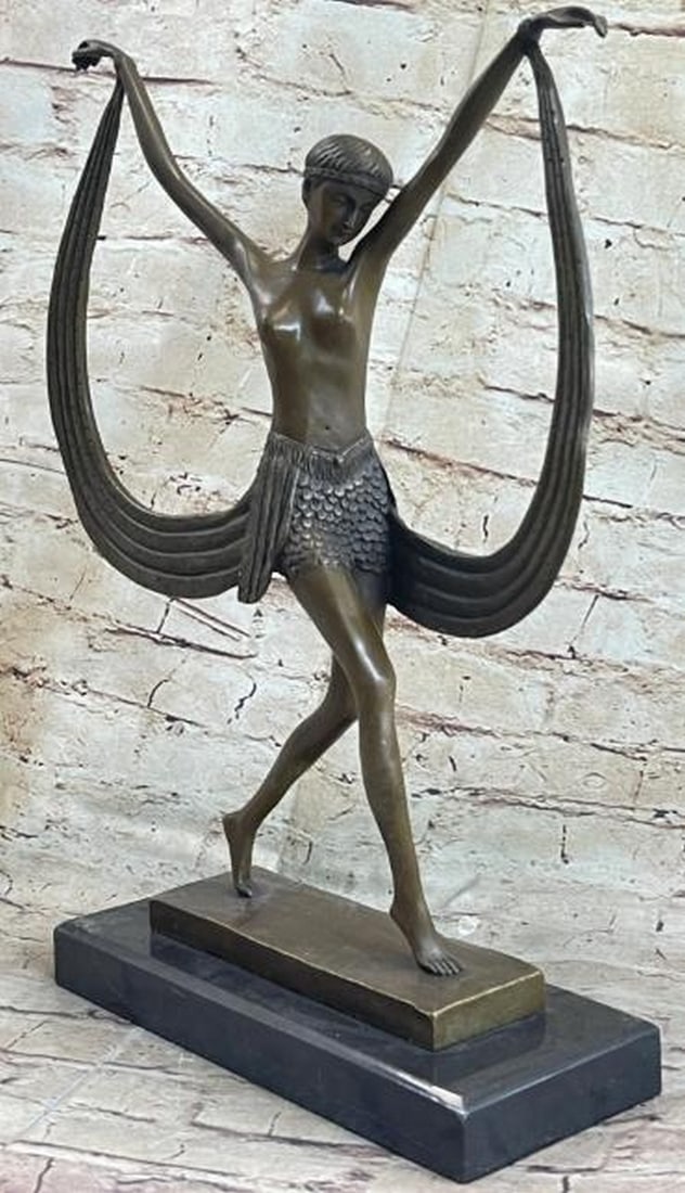 Ribbon Dance: Topless Female Dancer Bronze Sculpture: Ribbon Dance: Topless Female Dancer Bronze Sculpture Radiating movement and grace, this captivating bronze sculpture features a topless female dancer caught mid-performance, her body poised in an expr