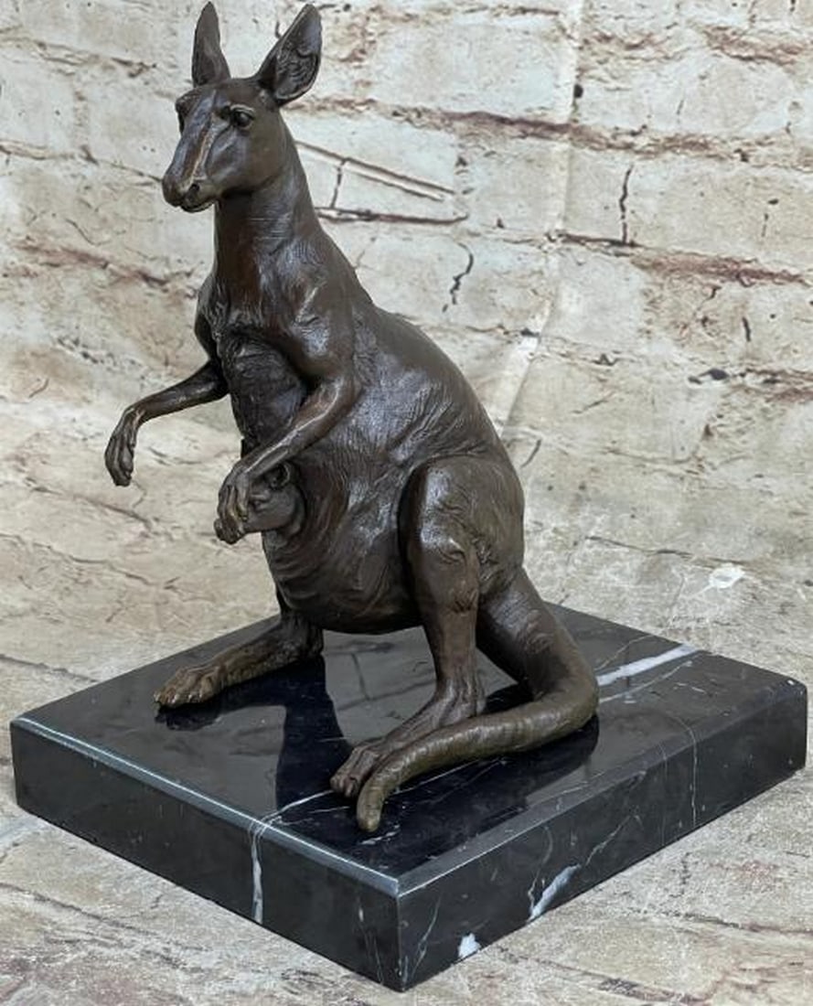 Outback Watch: Hot Cast Bronze Kangaroo with Joey: Outback Watch: Hot Cast Bronze Kangaroo with Joey This finely crafted hot cast bronze reproduction, bearing the signature of artist J. Mogniez, captures the iconic presence of Australia’s beloved ma