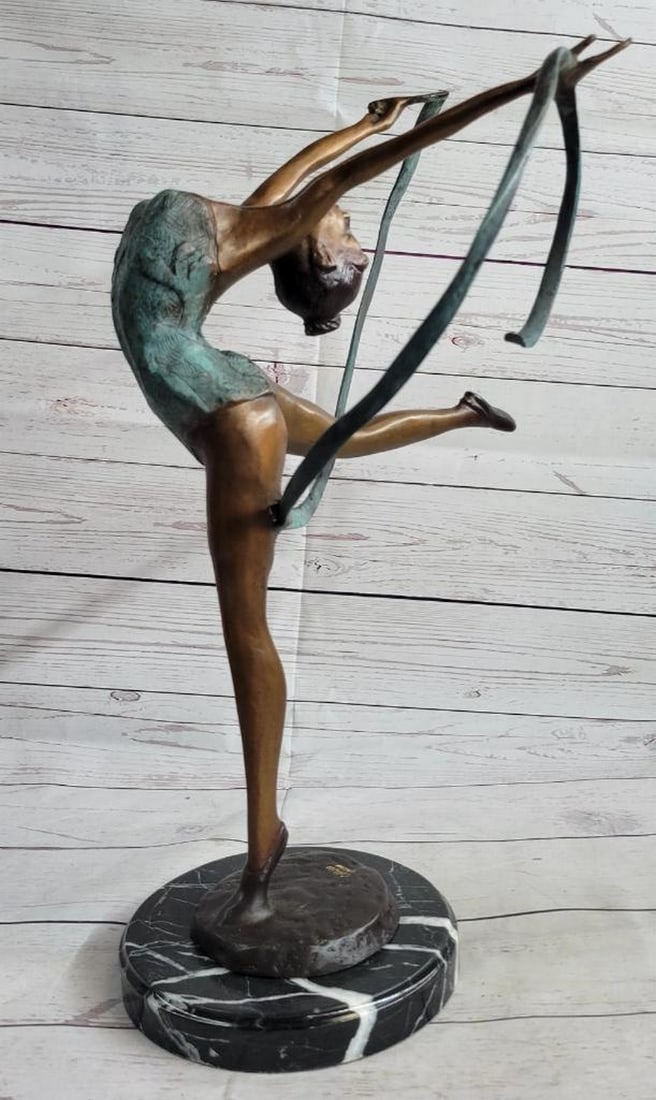 Graceful Dancer in Motion Original Bronze Sculpture by Collett - 21.5" x 14": Graceful Dancer in Motion Original Bronze Sculpture by Collett - 21.5" x 14" This exquisite bronze sculpture captures the essence of a graceful dancer in the midst of her performance. With her