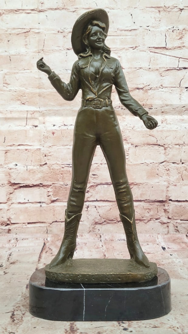 Female Western Rancher Original Bronze Statue - 14" x 7": Female Western Rancher Original Bronze Statue - 14" x 7" This compelling bronze sculpture by Aldo Vitaleh celebrates the enduring spirit of the American West through the confident figure of a 