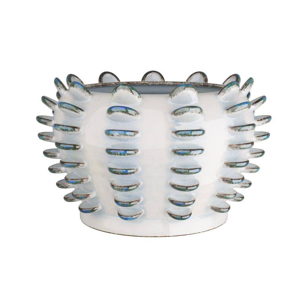 Reactive Blue, Ailee Collection Vase: Reactive Blue, Ailee Collection Vase Innovative form and artisanal craftsmanship, featuring a pristine white porcelain base that is set against a series of delicately arranged blue, oval-shaped protru