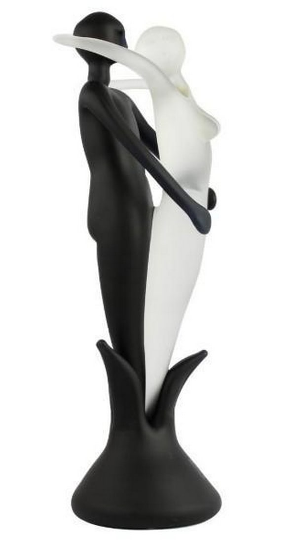 Lovers Embrace: Lovers Embrace Delicate and expressive, Lovers Embrace captures an intimate moment frozen in time. Crafted from frosted Murano glass, the sculpture’s soft, matte surface enhances the fluid lines and