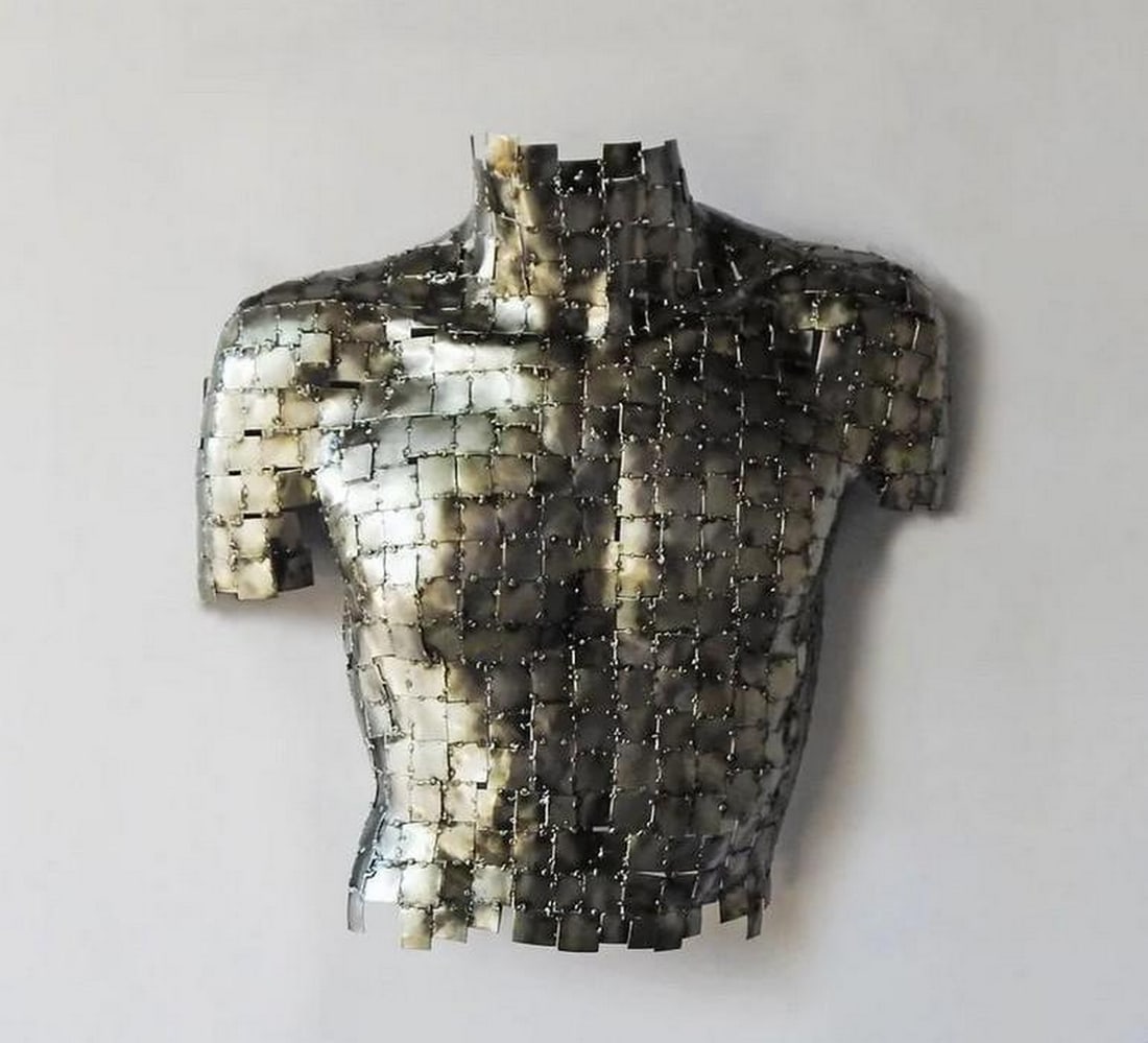 The Essence of Strength: Metal Male Torso Sculpture: The Essence of Strength: Metal Male Torso Sculpture This striking metal sculpture captures the raw power and elegance of the male form. Crafted from brass, bronze, and metal, the piece intricately ass