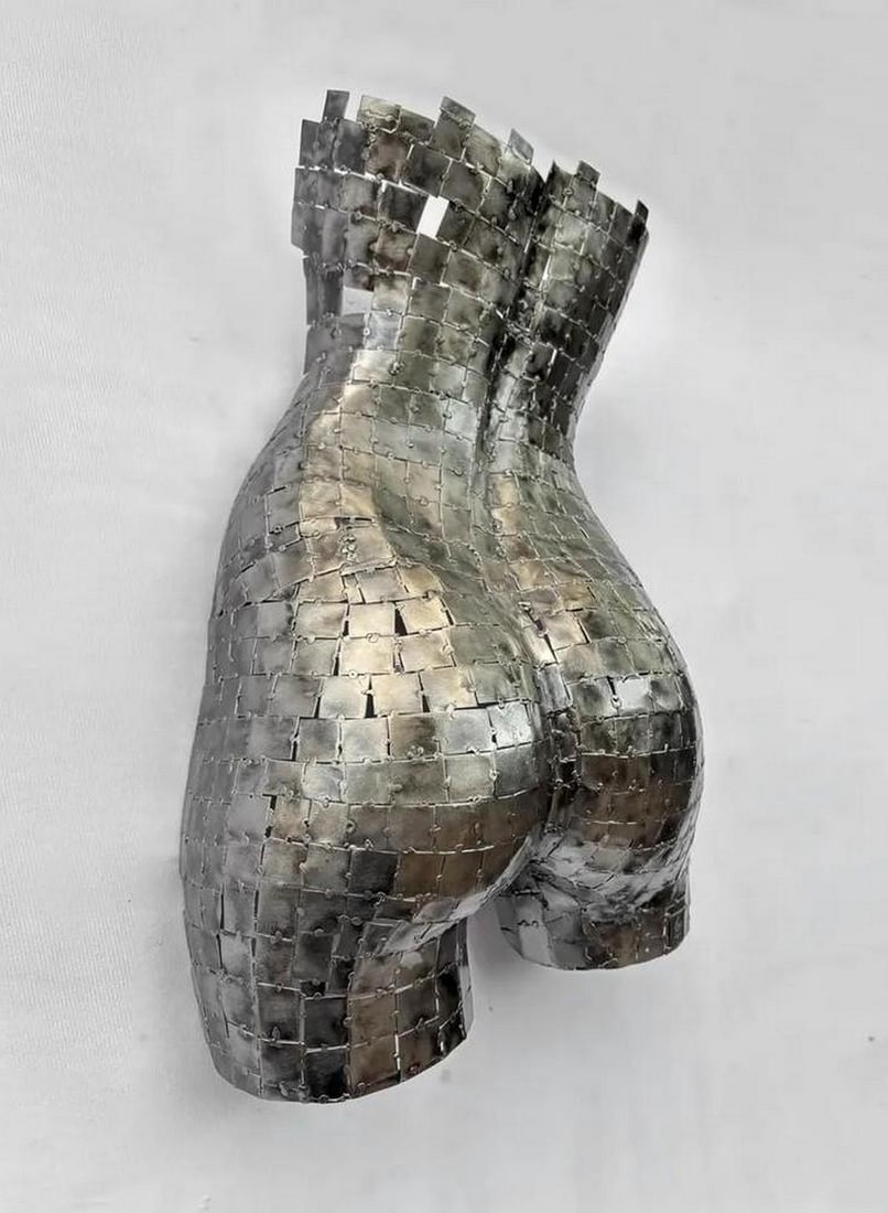 Abstract Female Torso Metal Wall Sculpture: Abstract Female Torso Metal Wall Sculpture This captivating Abstract Female Torso Metal Wall Sculpture is an elegant fusion of strength and sensuality. Handcrafted from hundreds of meticulously welded