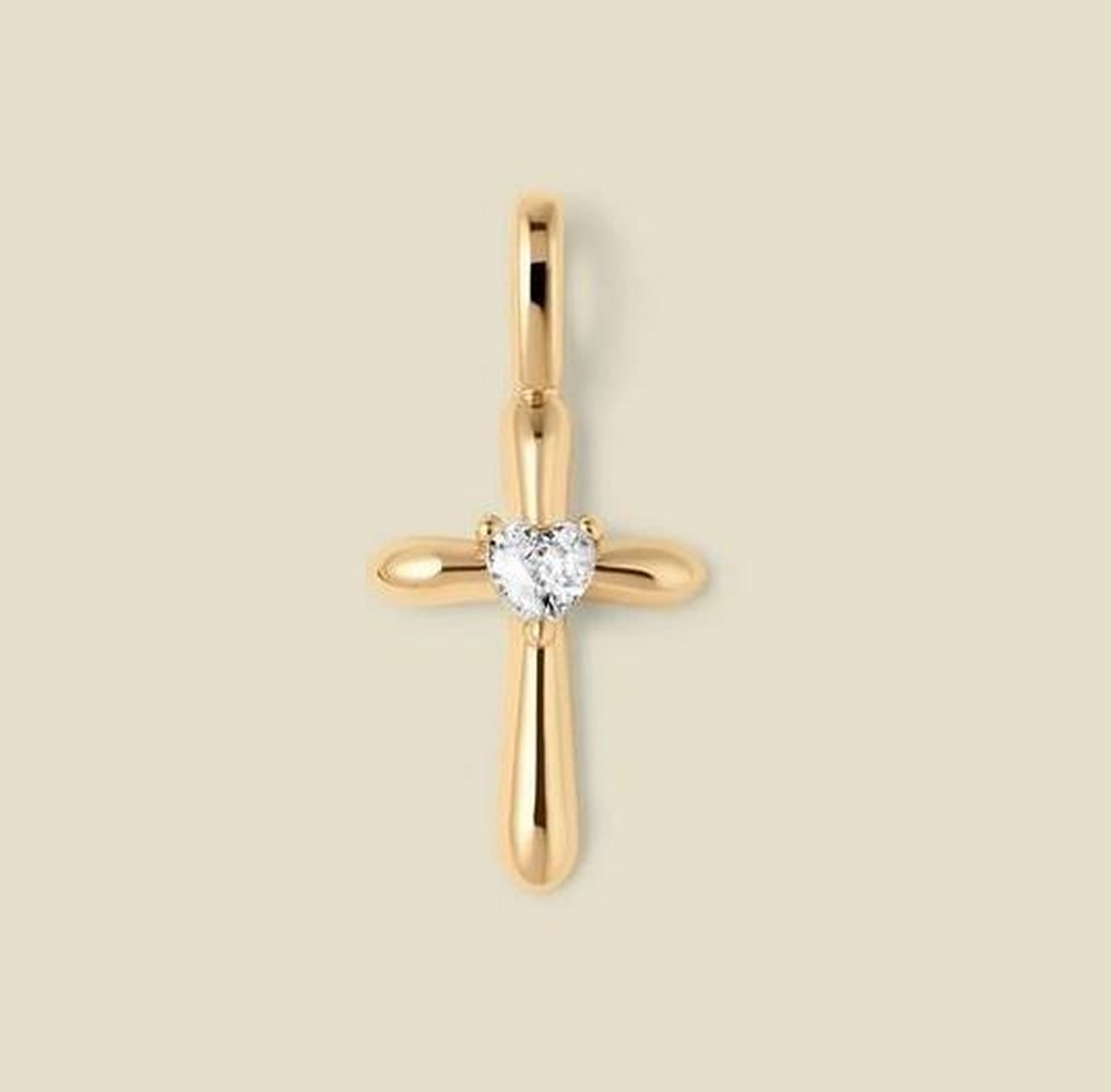Gold Vermeil Heart Cross Charm with CZ: Gold Vermeil Heart Cross Charm with CZ A heart and cross combined into a single charm design, featuring a cubic zirconia heart at the center for subtle contrast and light reflection. Designed for