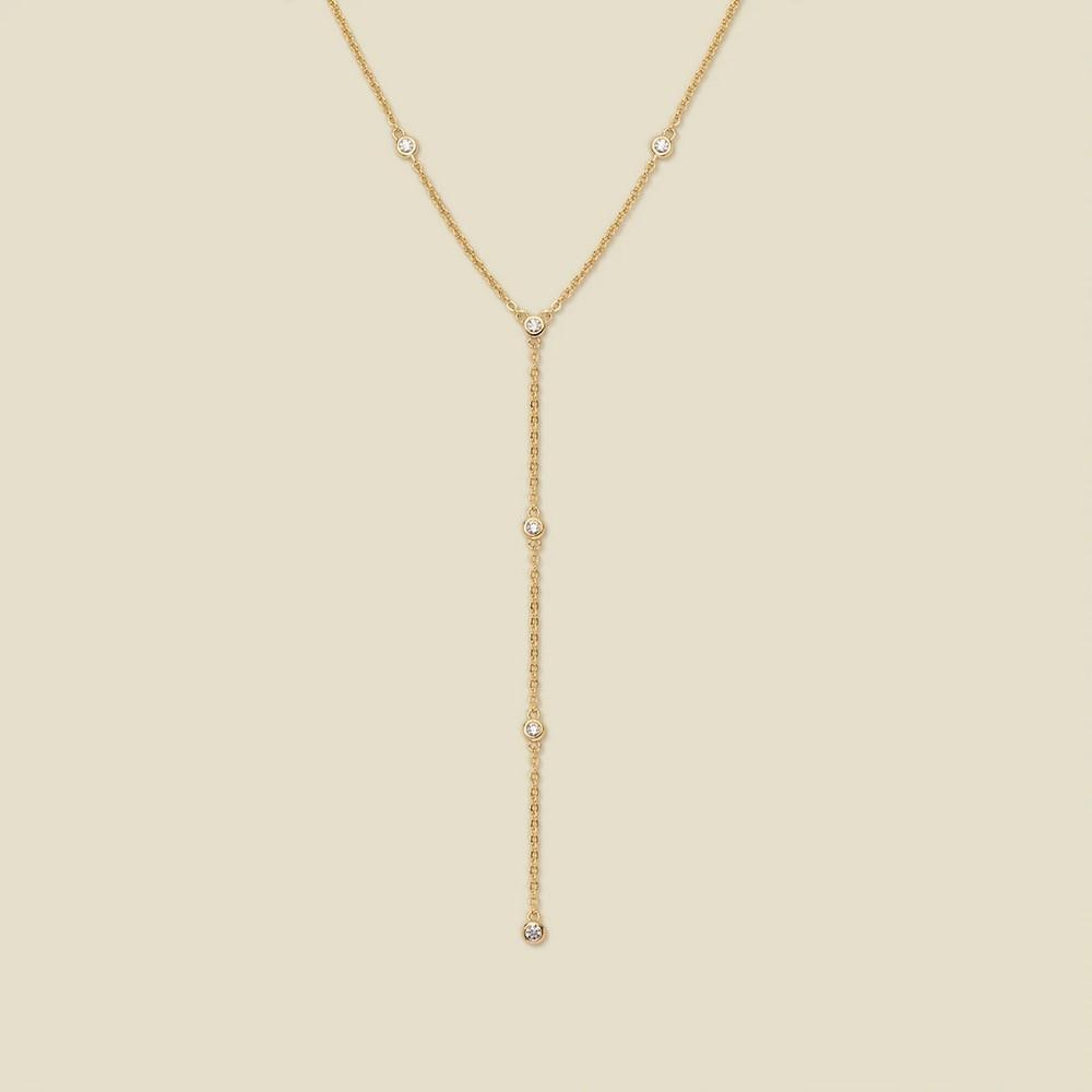 Gold Vermeil CZ Drop Necklace: Gold Vermeil CZ Drop Necklace A Y-shaped necklace crafted in gold vermeil, featuring bezel-set cubic zirconia stones that catch light from multiple angles. The main chain measures 16 inches with a 1.5