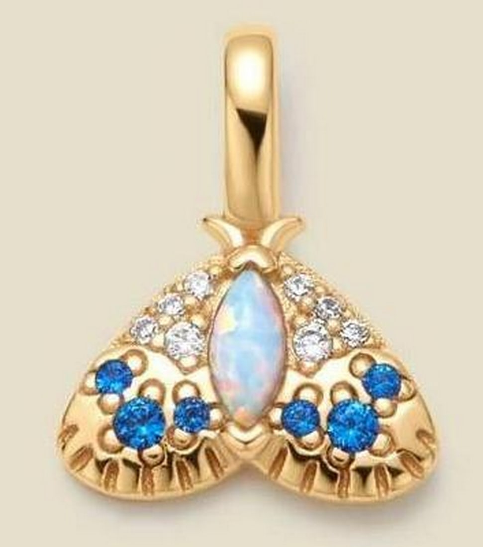 Seeker of Light Opal Moth Charm: Seeker of Light Opal Moth Charm Inspired by the moth’s unwavering pursuit of light, this charm symbolizes courage and the journey toward your true path. Featuring a radiant opal and tiny CZs, it ser