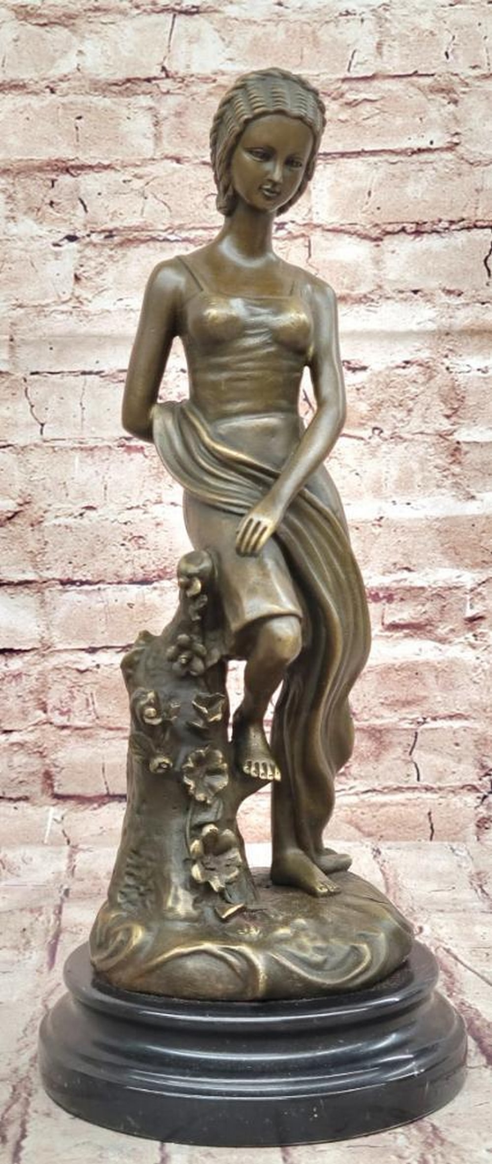 Young Girl Sitting on a Tree Near a Pond Bronze Sculpture by Milo - 14.5" x 6": Young Girl Sitting on a Tree Near a Pond Bronze Sculpture by Milo - 14.5" x 6" This captivating bronze sculpture by Milo depicts a young girl serenely perched on a tree branch, overlooking a t