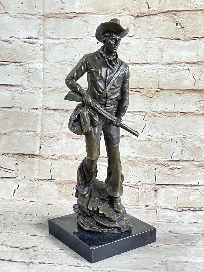 Signed Original Cowboy Bronze Sculpture - 12.5" x 5": Signed Original Cowboy Bronze Sculpture - 12.5" x 5" This is a sculpture of a classic cowboy. He wears his cowboy hat and his handkerchief loosely tied around his neck. On his feet he wears bo