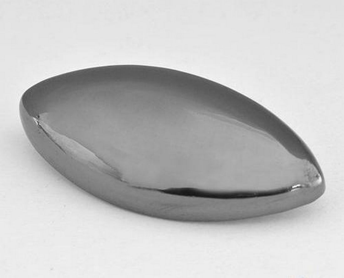 30.85 ct Natural Silver Gray Hematite, Marquise Cabochon, Opaque, Brazil: 30.85 ct Natural Silver Gray Hematite, Marquise Cabochon, Opaque, Brazil Natural hematite gemstone weighing 30.85 ct, cut in a marquise cabochon shape with a silver-gray color. The gem measures 29.61 