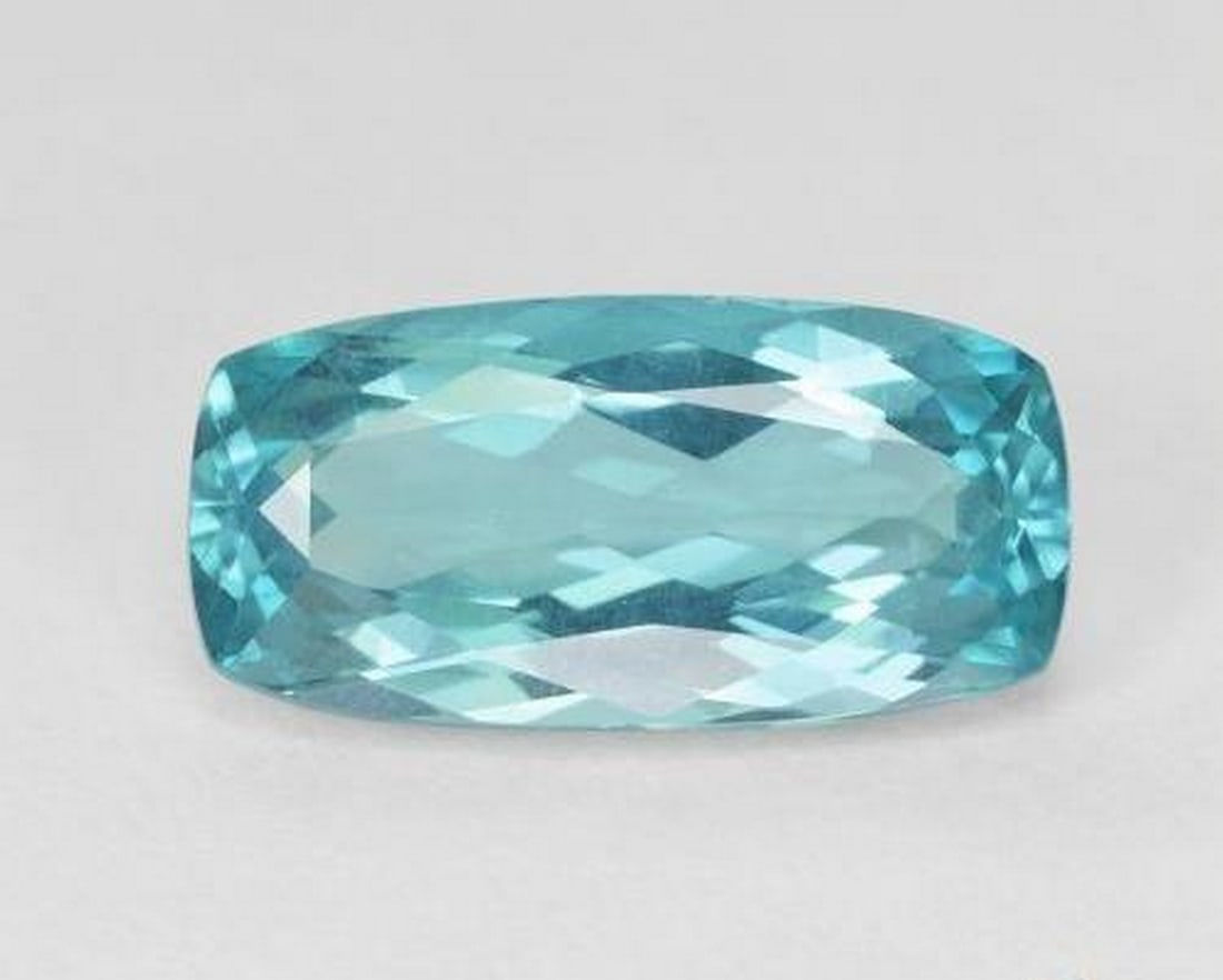 5.63 ct Natural Electric Blue Green Apatite, Cushion Cut, VVS-VS, Madagascar: 5.63 ct Natural Electric Blue Green Apatite, Cushion Cut, VVS-VS, Madagascar Natural apatite gemstone weighing 5.63 ct, cut in a cushion facet shape with an electric blue-green color. The gem measures