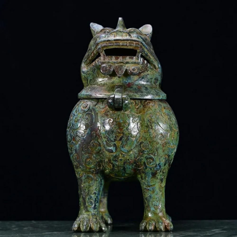 Antique Chinese Bronze Animal Statue Ornament: Antique Chinese Bronze Animal Statue Ornament This rare handcrafted bronze statue captures the spirit and symbolism of a revered animal in Chinese culture. With exquisite detailing and a timeless desi