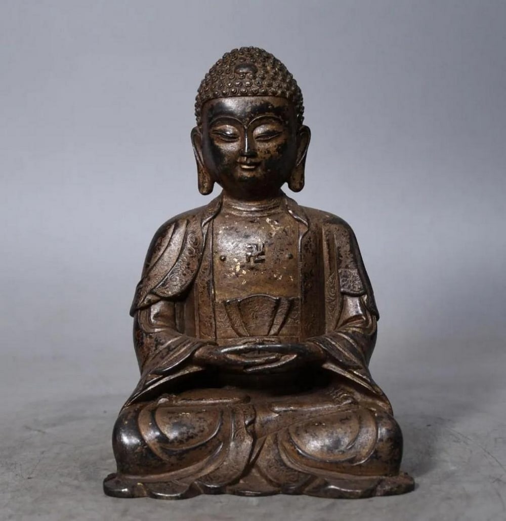 Pure Copper & Cinnabar Amitabha Buddha Statue: Pure Copper & Cinnabar Amitabha Buddha Statue This rare and exquisite statue features Amitabha Buddha, masterfully crafted in pure copper and accented with cinnabar detailing. A testament to tradi