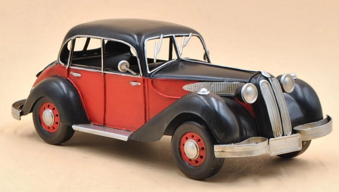 Burago 1:12 Scale Diecast Model: BMW 328 Roadster 1930s–1940s: Burago 1:12 Scale Diecast Model: BMW 328 Roadster 1930s–1940s Add a vintage touch to your table, desk, or shelf with this BMW 328 Roadster model. Crafted with a rustic iron frame, it features a blac
