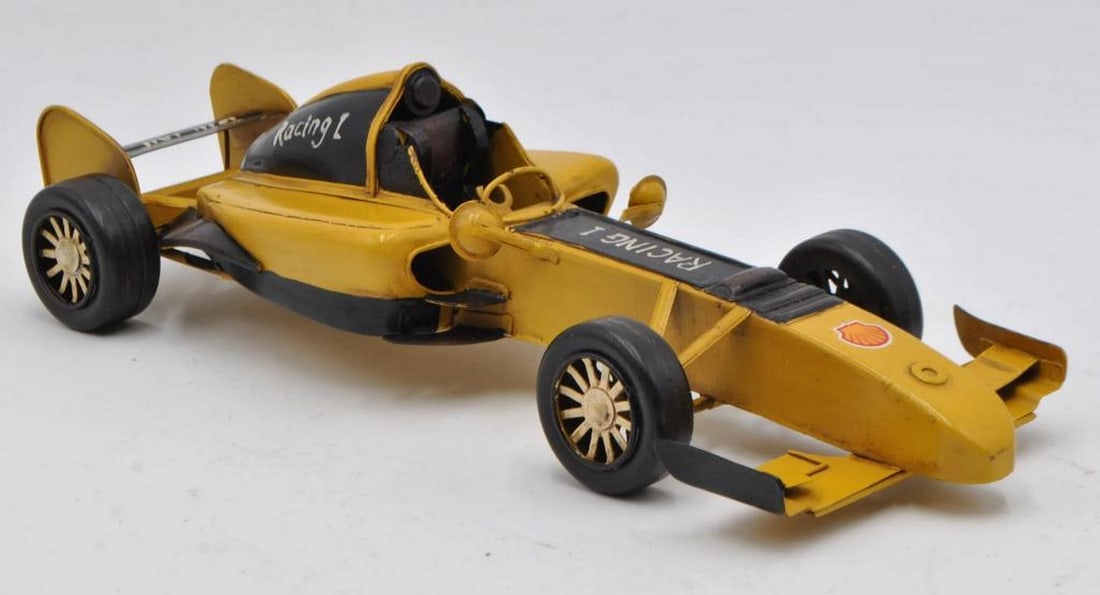 Rustic 2001 Ferrari F1 - Yellow & Black Trim Die Cast Metal Decor: Rustic 2001 Ferrari F1 - Yellow & Black Trim Die Cast Metal Decor Decorate any table, desk, or shelf with sporty elegance using our Rustic 2001 Ferrari F1 Sculpture. Featuring a rustic iron frame,